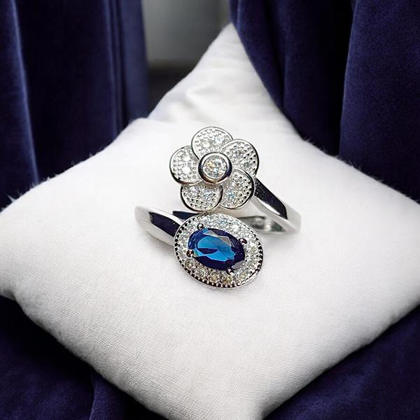 Adjustable Ring with Blue Stone and Diamond Floral Design