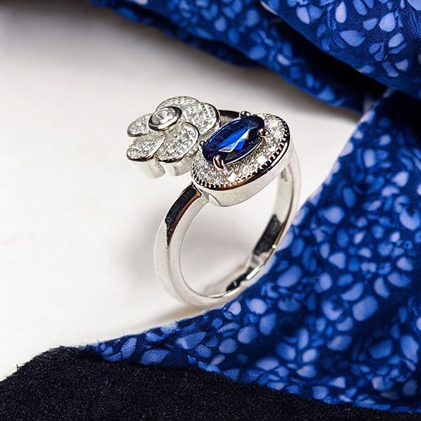 Adjustable Ring with Blue Stone and Diamond Floral Design